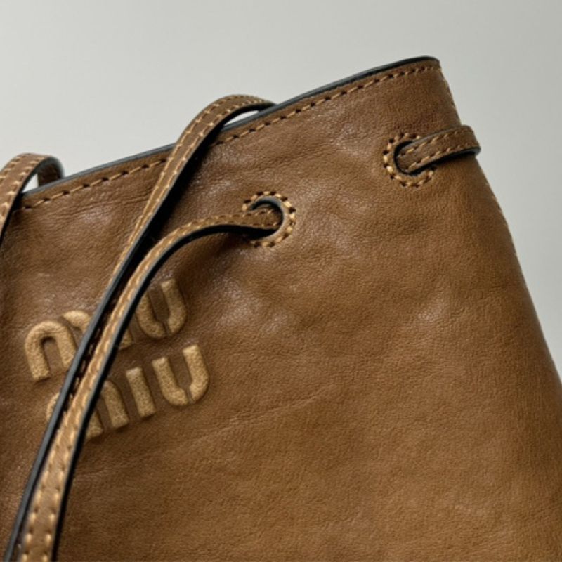 Miu Miu Embossed Lettering Logo Mini Bag