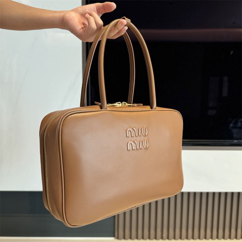 Miu Miu Leather Top handle Bag in Brown