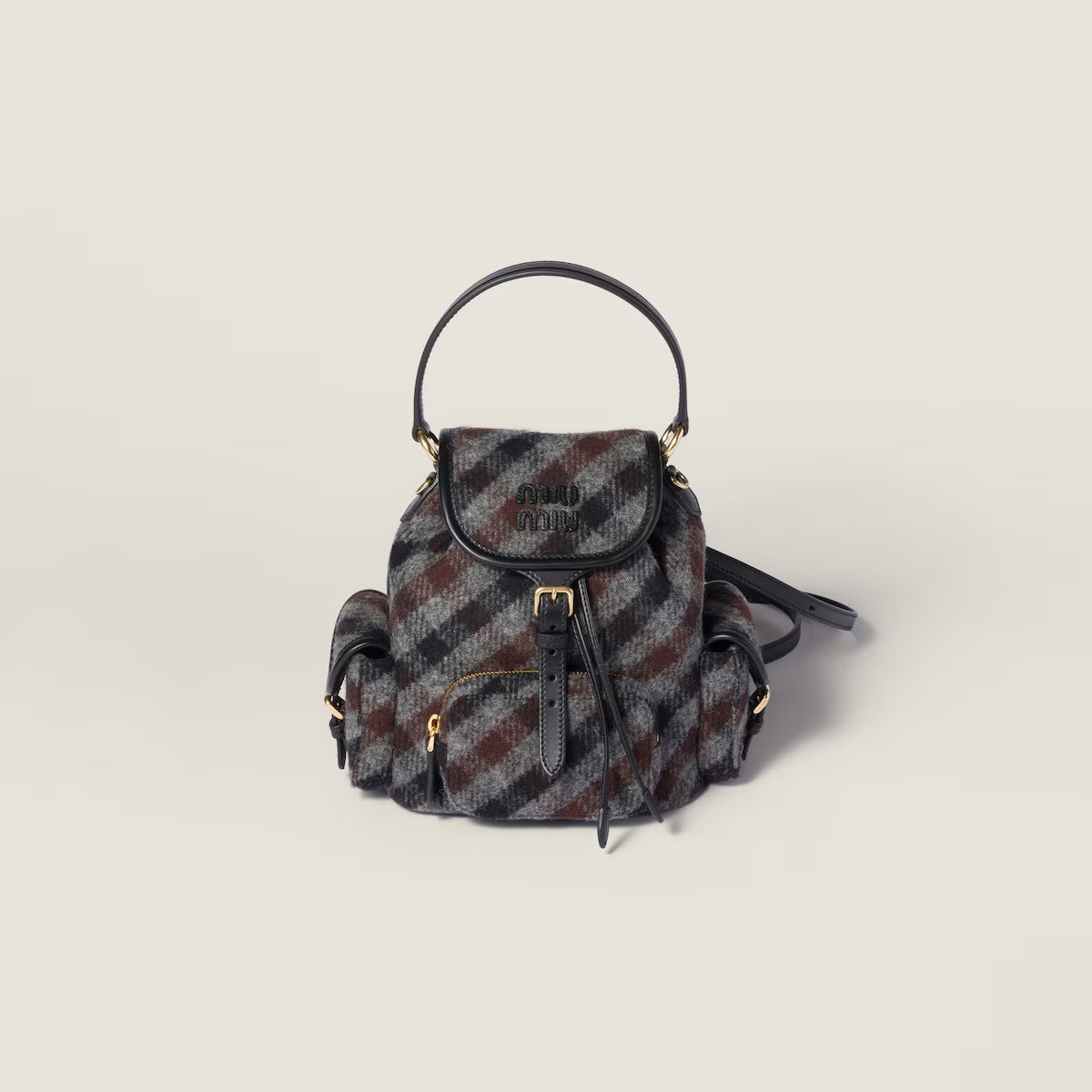 Miu Miu Plaid and leather backpack