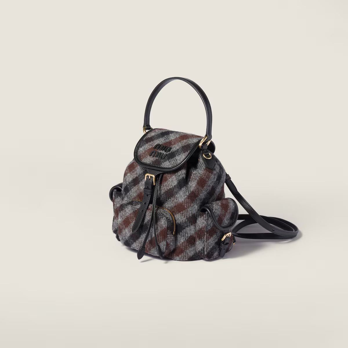Miu Miu Plaid and leather backpack
